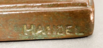 Handel Stamped on Side of Base